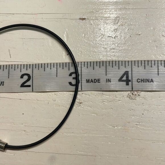 7” black metallic bangle bracelet w/0.5” silver tone diamond etched charm - Picture 7 of 8